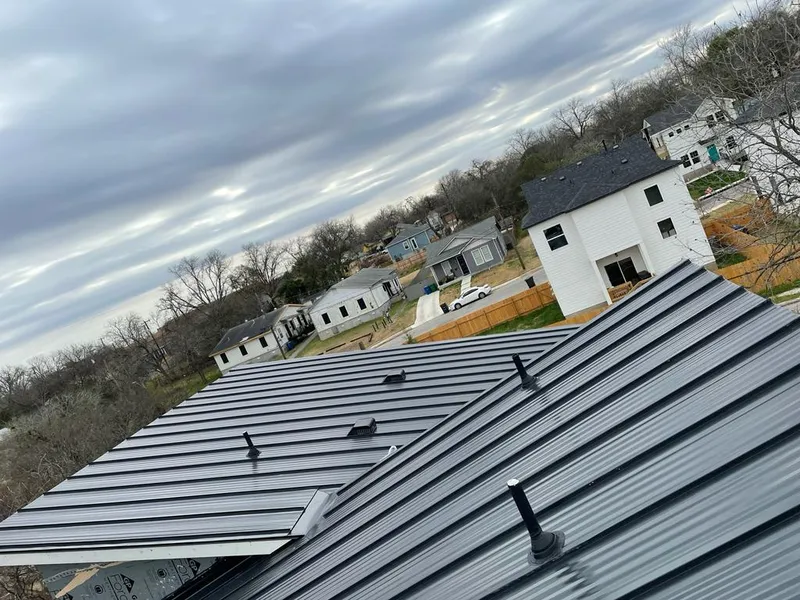 Standing seam metal roof panels with vents for Skylight Repair in Murphy